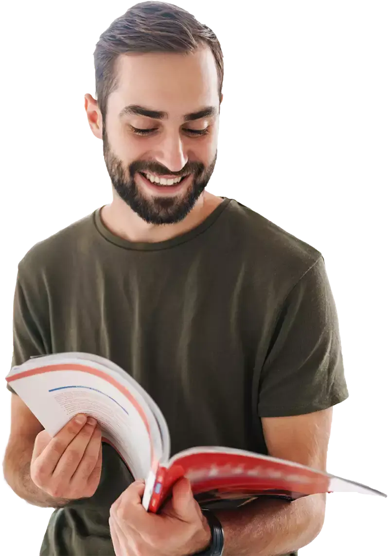 A reader holding a Thomas Group Printing book