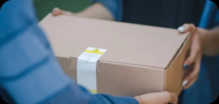 Shipping courier delivering a package