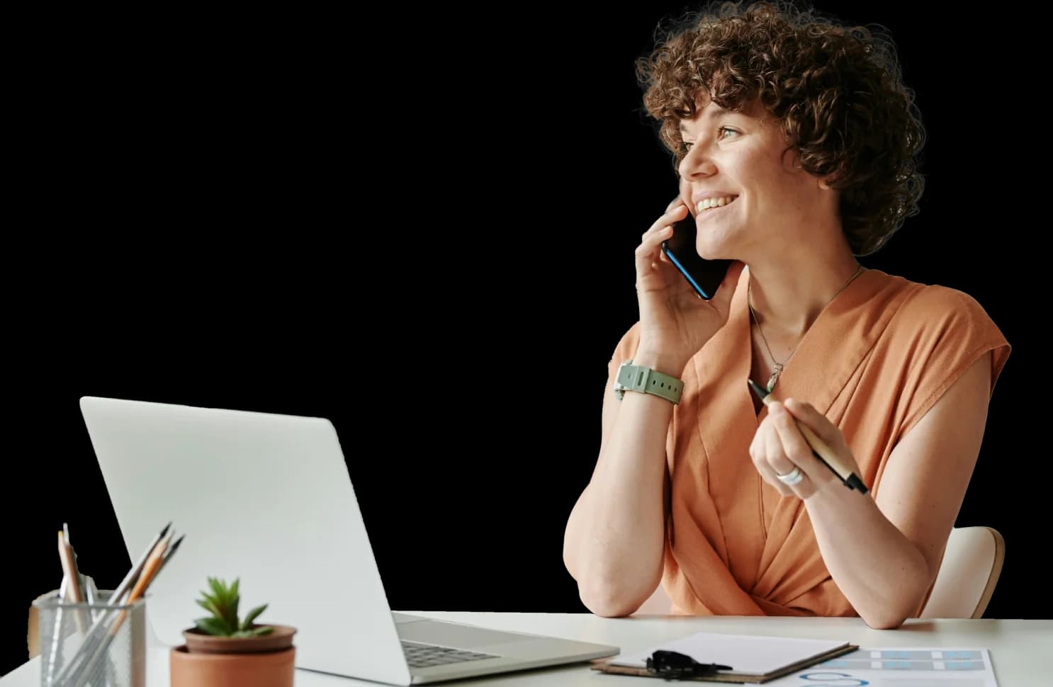 Person smiling while on the phone