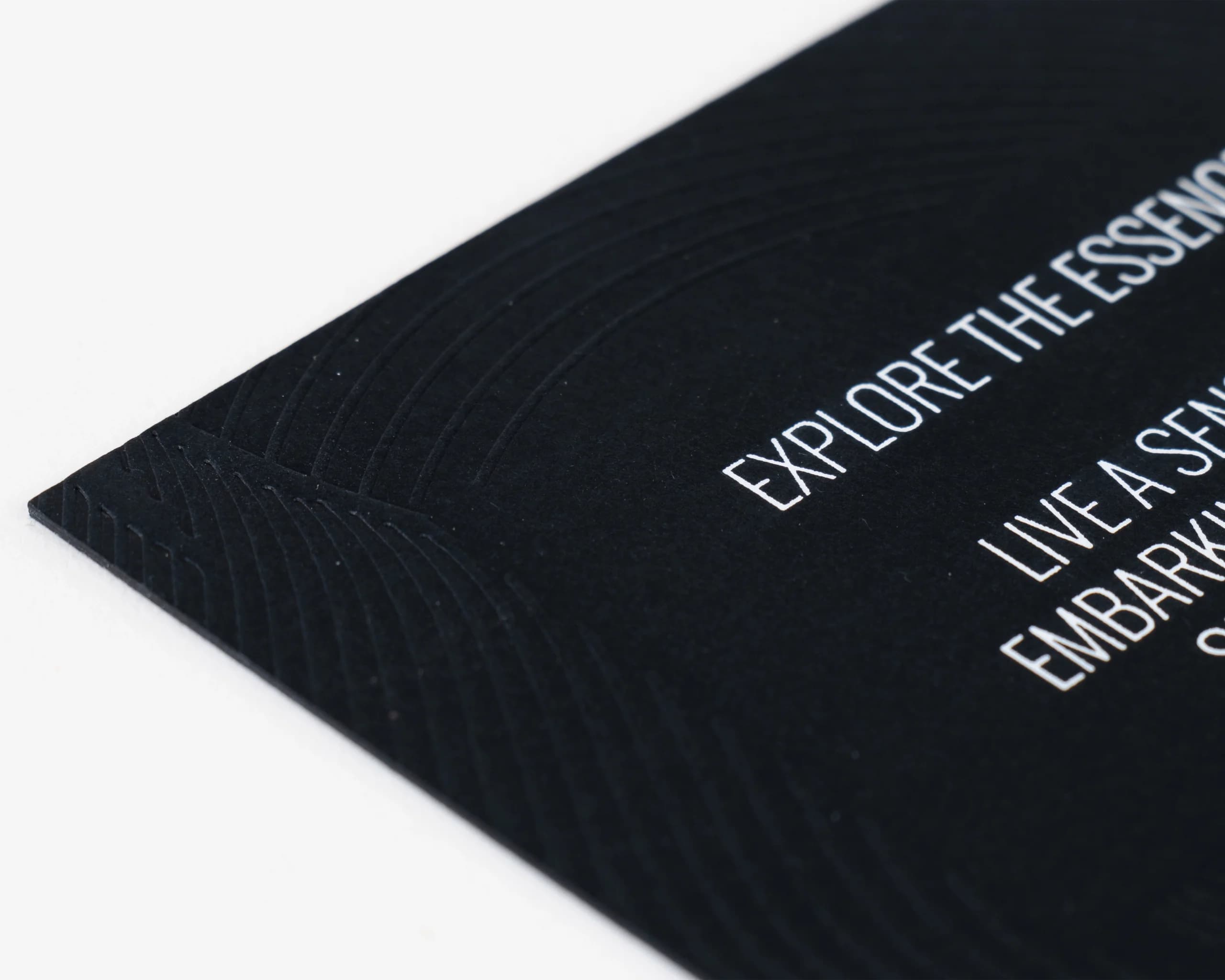 Close-up of embossed texture on luxury printed black card