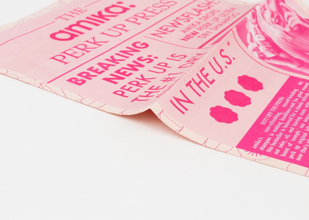 Amika tabloid newspaper design example