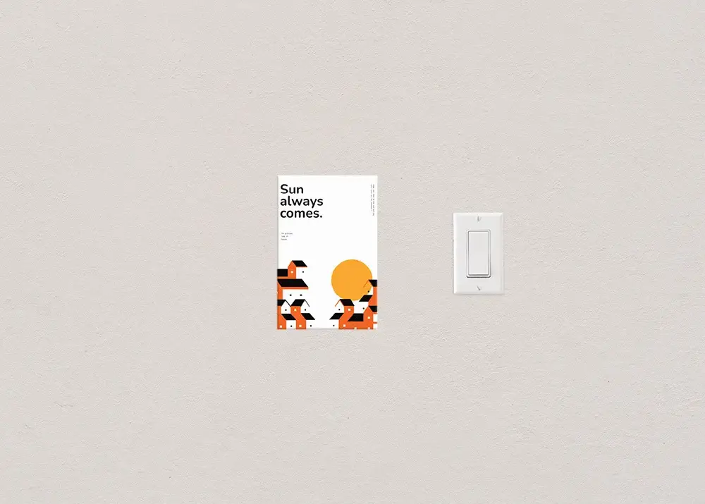 The 5.5 x 8.5 inch flyer size photographed next to a standard light switch to show scale.