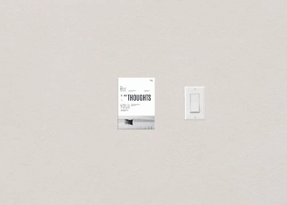 The 5 x 7 flyer size photographed next to a standard light switch to show scale.