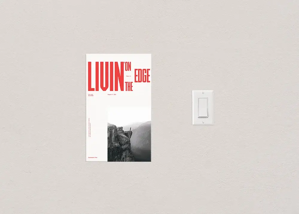 The 8.5 x 14 flyer size, or legal sized flyer, photographed next to a standard light switch to show scale.