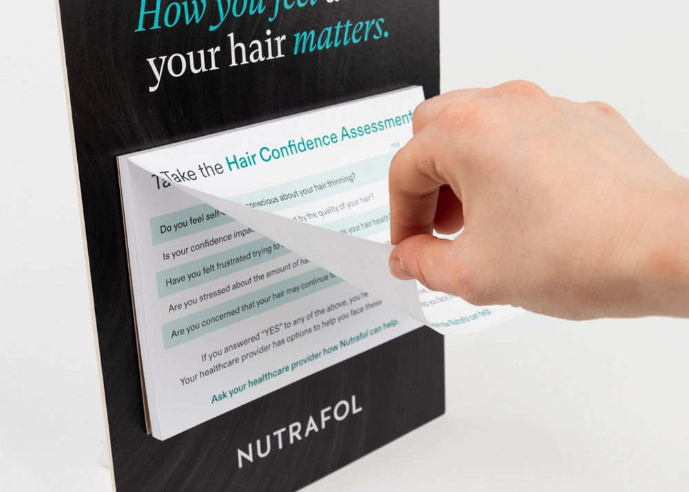 Nutrafol printed brand collateral example
