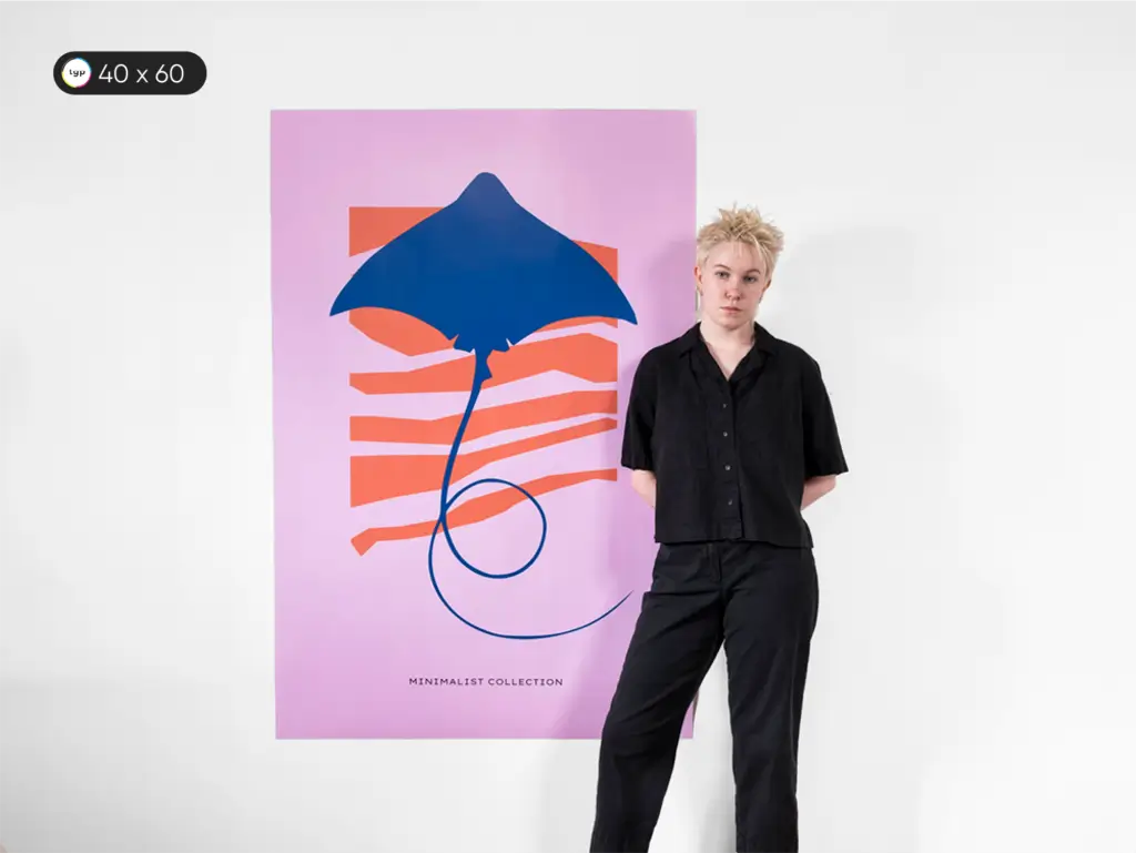 Model standing beside a large 40 x 60 inches or B0 size poster, known as Bus Stop Poster. The size of this poster is roughly the size of a small person, comparable to advertisements seen at bus stops or billboards.