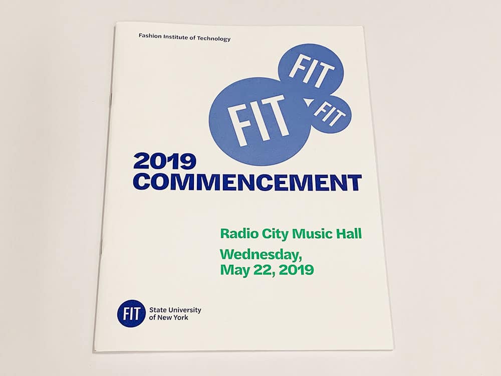 A saddle stitched commencement booklet printed for FIT