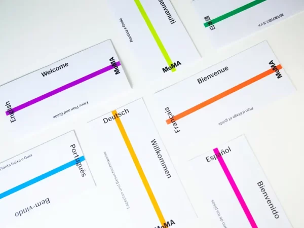 Brochure Printing Job for MoMa with multicolored brochures in several languages